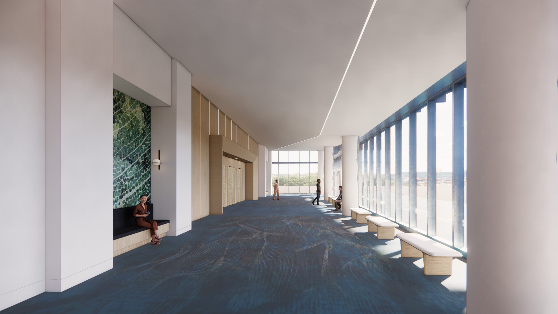 One of the spacious hallways of the newly remodeled Bradenton Area Convention Center are rendered with floor-to-ceiling windows letting plenty of natural light in as people take advantage of the various seating options available to event attendees in Florida's Gulf Coast.