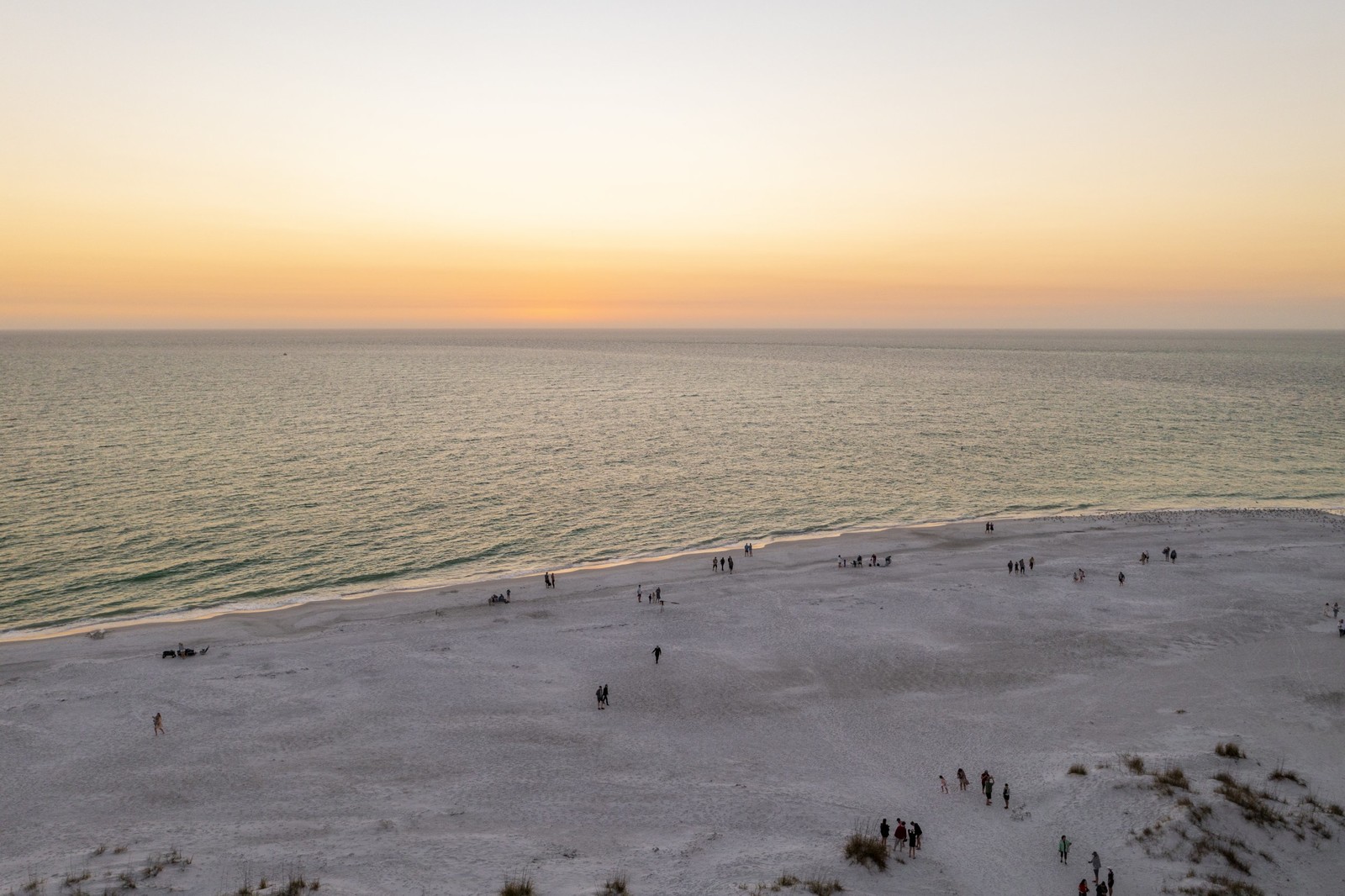 Bean Point Beach at sunset with a orange and blues sunset afterglow