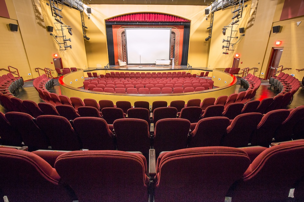 a theater with red seats