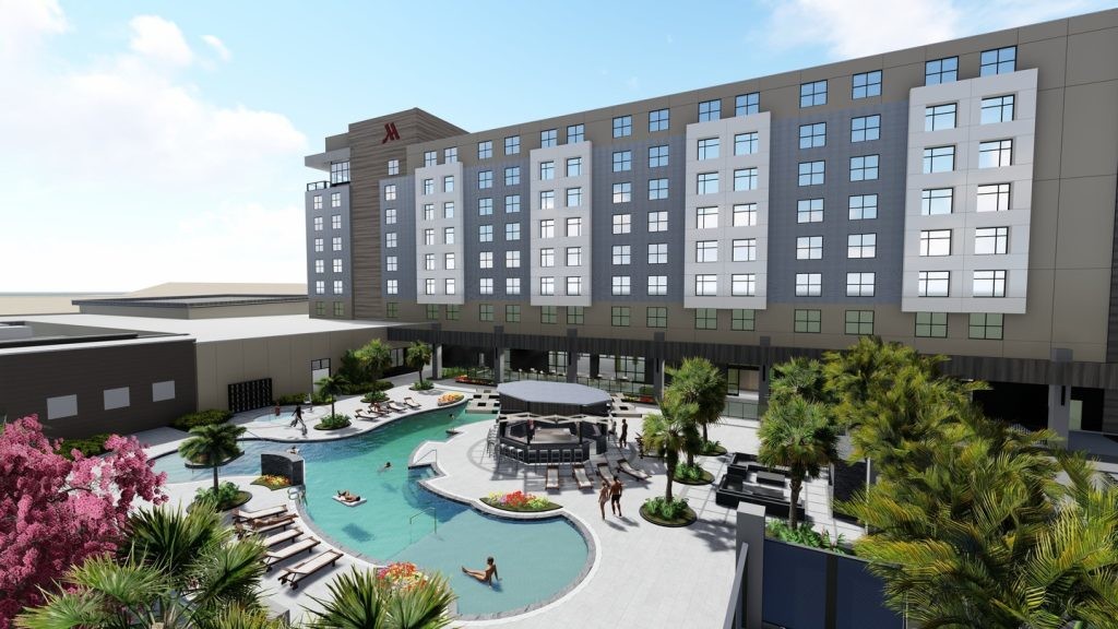 An active pool deck of the Marriott Palmetto Resort & Spa, connected to the Bradenton Area Convention Center by a climate-controlled corridor, is seen on a beautiful sunny day.