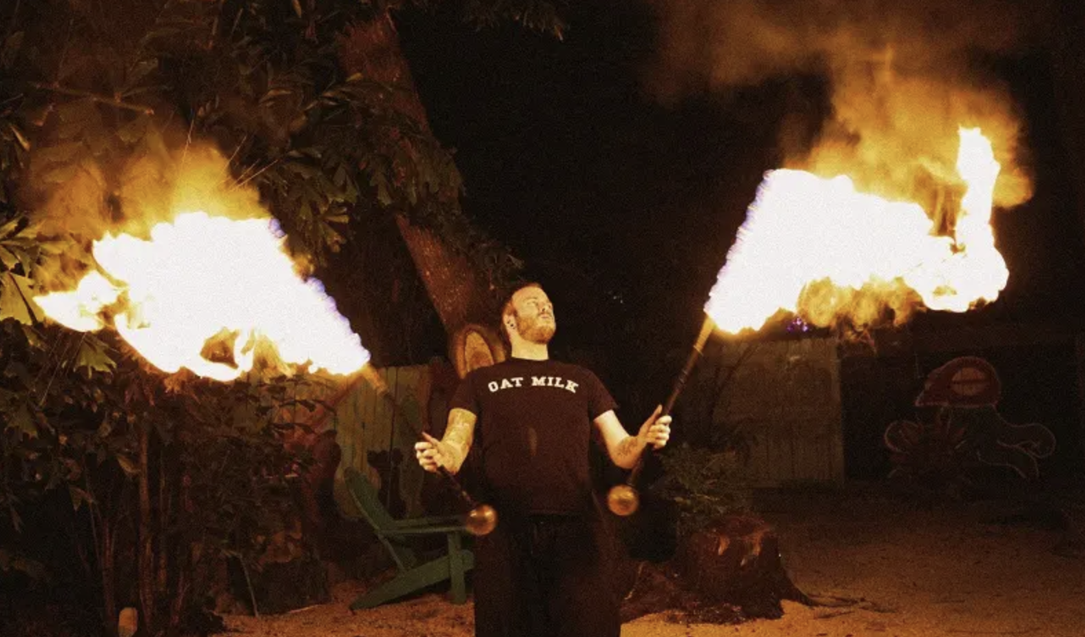 fire twirling at night at the 13th & 13th art market